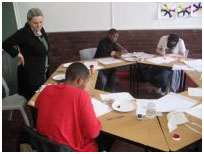 Learners and a facilitator in a design classroom